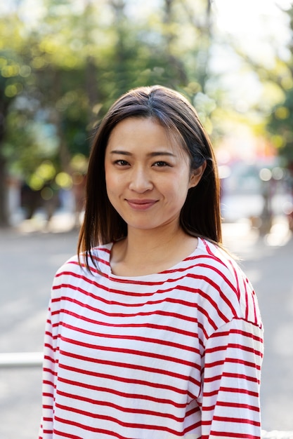 Young woman walking through the neighborhood