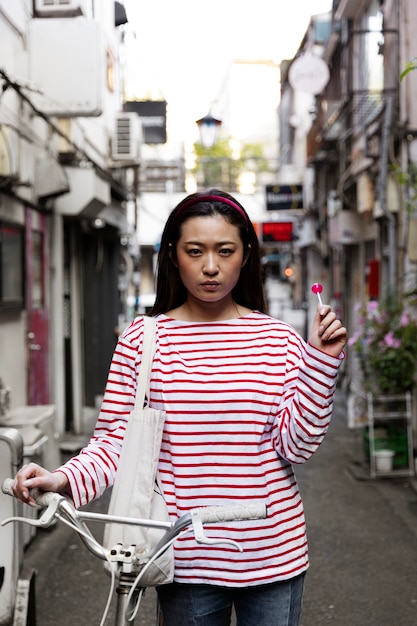 Young woman walking through the neighborhood