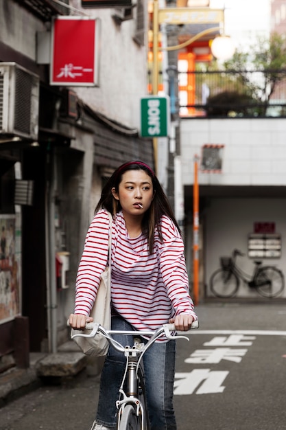 Young woman walking through the neighborhood