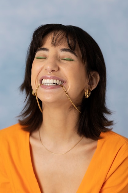 Young woman wearing chain necklace