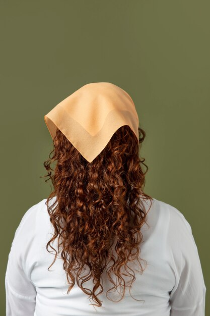 Young woman wearing a handkerchief as a hair accessory