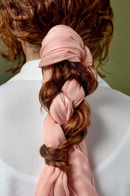 Young woman wearing a handkerchief as a hair accessory