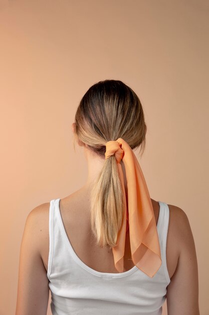 Young woman wearing a handkerchief as a hair accessory