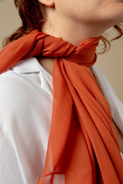 Young woman wearing a handkerchief as a neck accessory