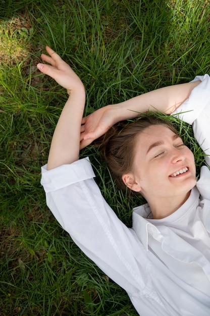 Young woman wearing messy bun hairstyle