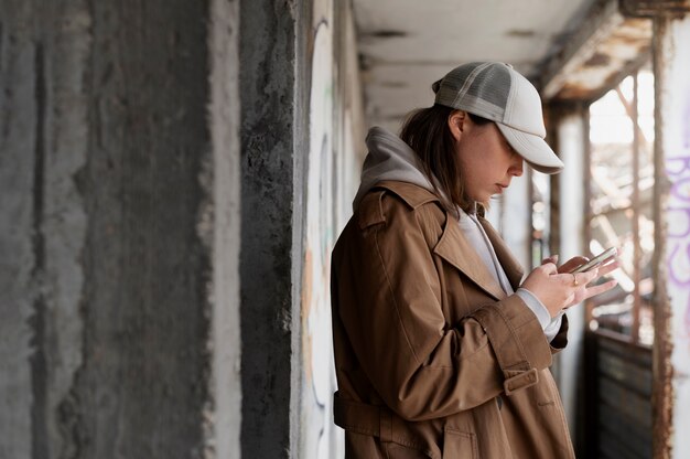 Young woman wearing trucker hat