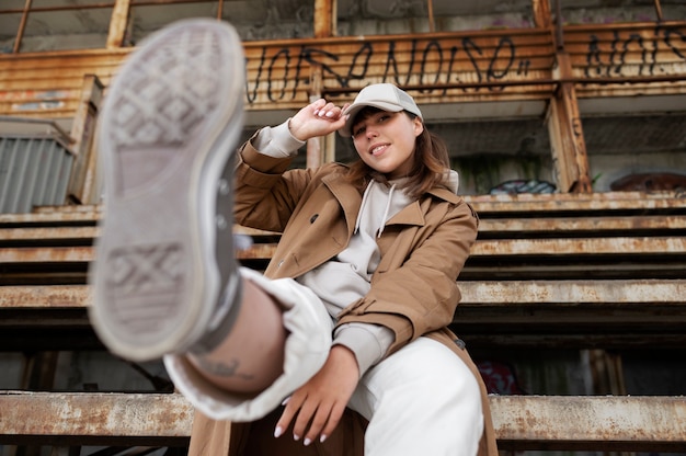 Young woman wearing trucker hat