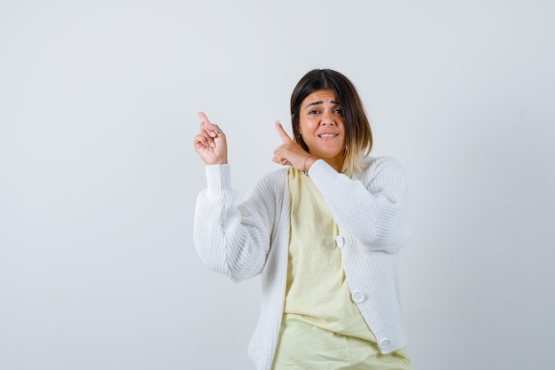 Young woman wearing a white cardigan