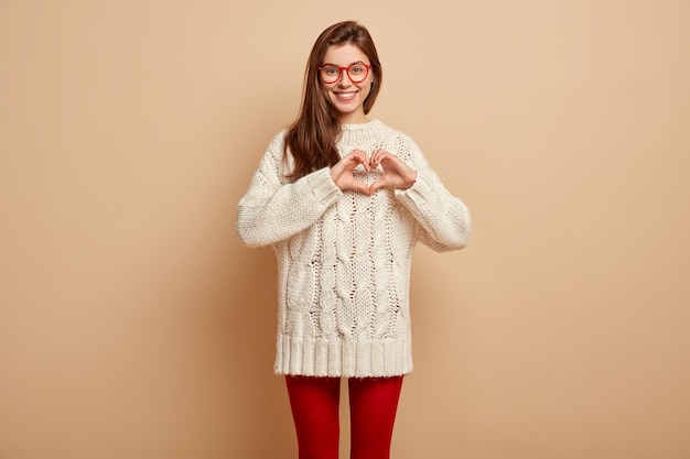 Free Photo young woman wearing white sweater