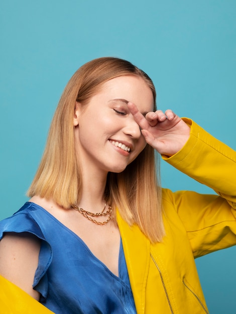 Young woman with chain necklace posing