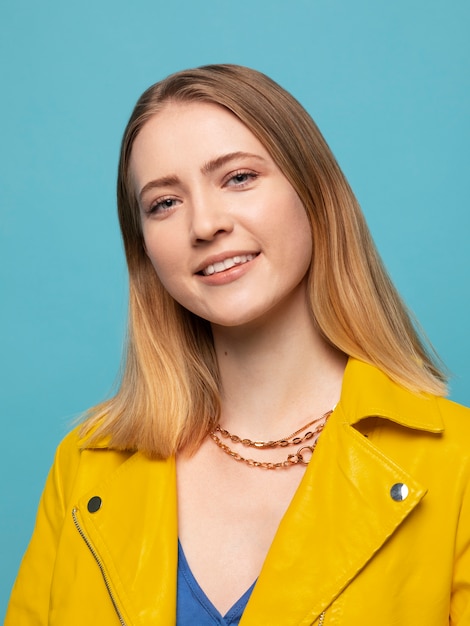 Young woman with chain necklace posing