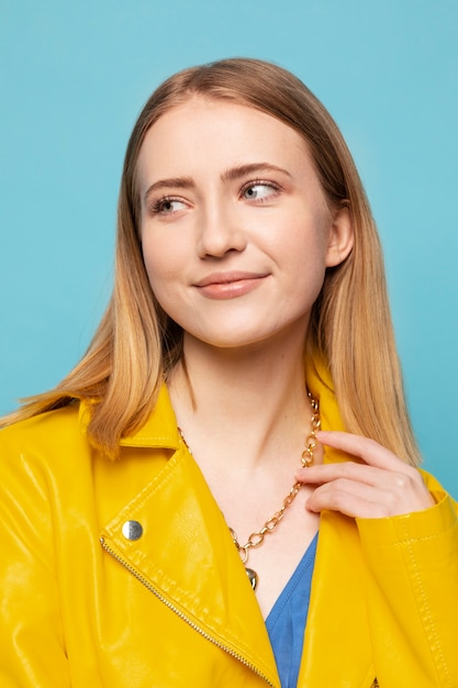 Young woman with chain necklace posing