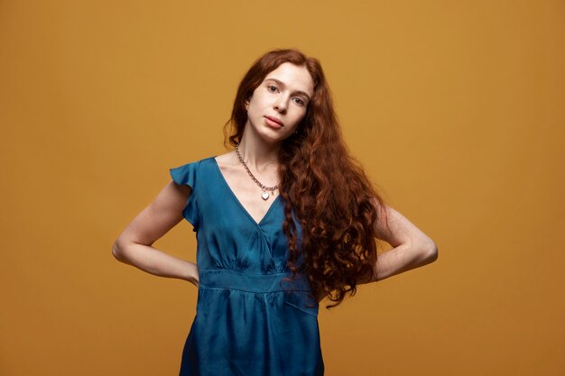 Young woman with chain necklace posing