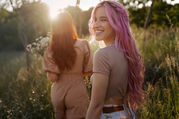 Young woman with dyed hair in summertime