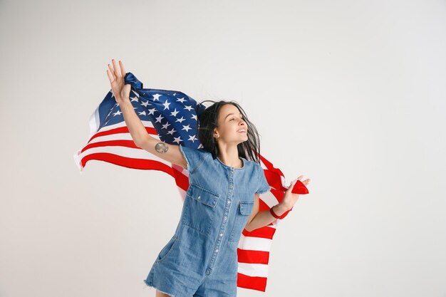 Young woman with the flag of United States of America