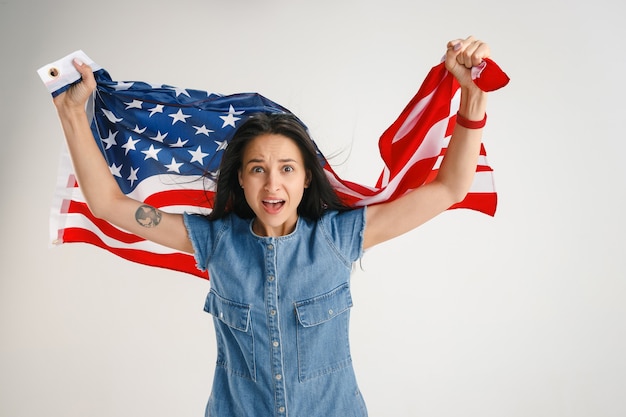 Free Photo young woman with the flag of united states of america