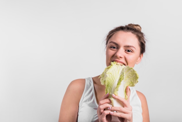 Free photo young woman with fresh cabbage