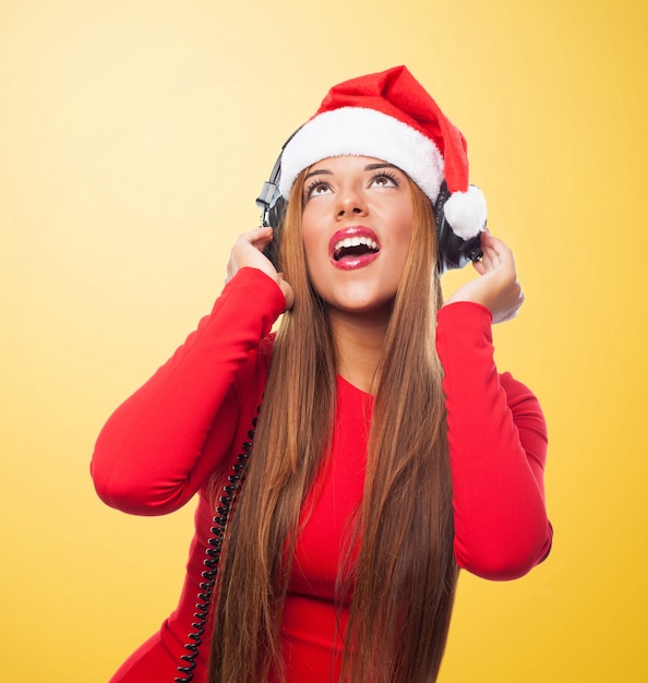 Free photo young woman with headphones singing