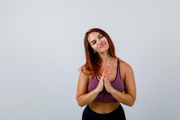 Young woman with long hair wearing sportswear