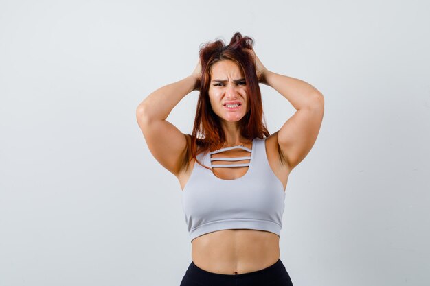 Young woman with long hair wearing sportswear