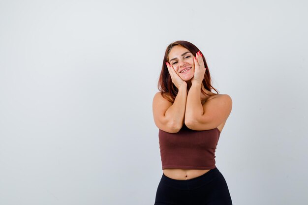 Young woman with long hair wearing sportswear