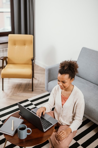 Young woman working from a modern place