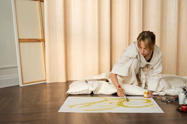 Young woman working in her worshop