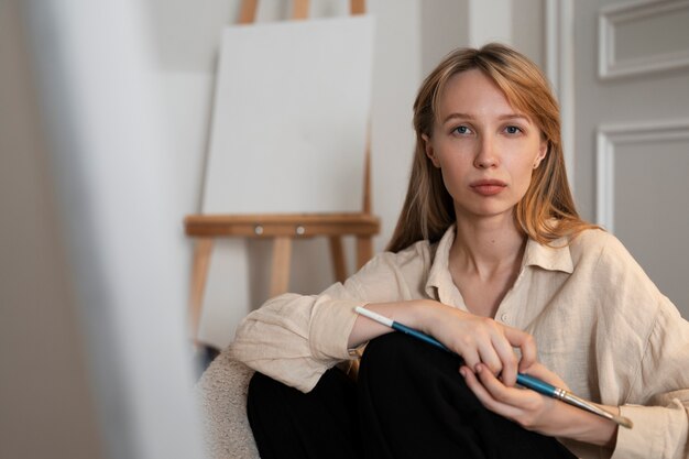 Young woman working in her worshop