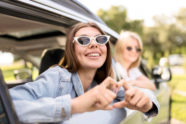 Young women getting ready for a trip