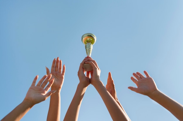 Young women holding a sports cup