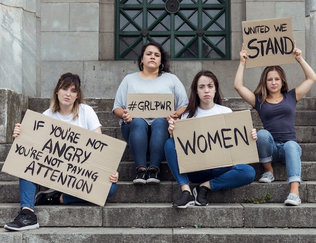 Free photo young women marching for equal rights