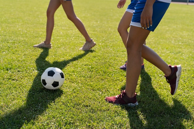 Young women playing football