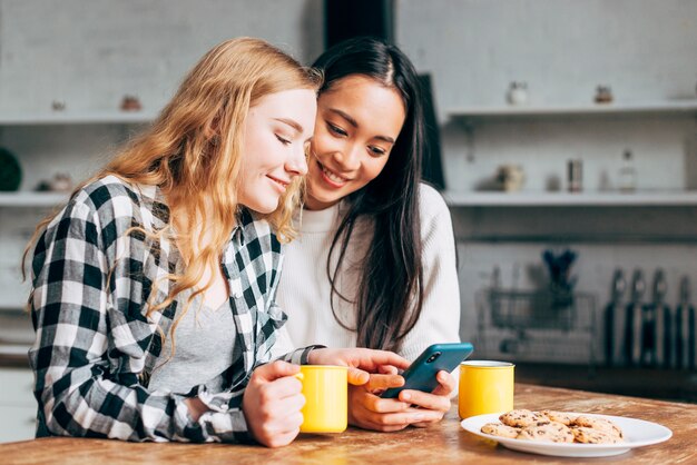 Young women surfing in smartphone