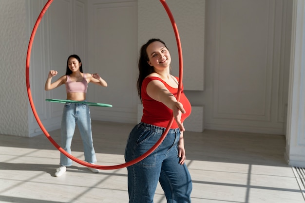 Young women with hula hoop