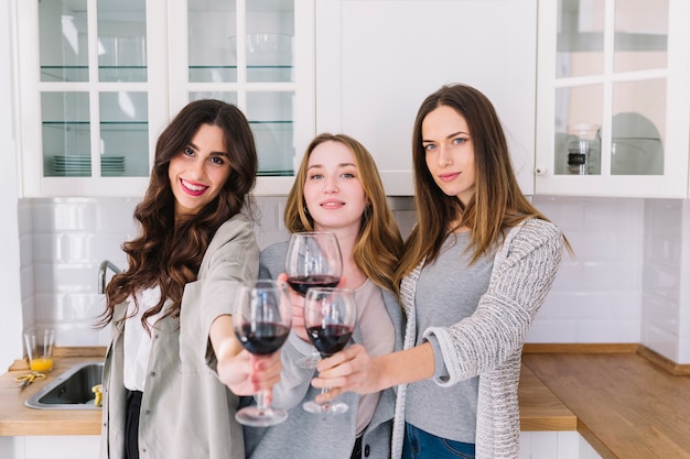 Young women with wineglasses