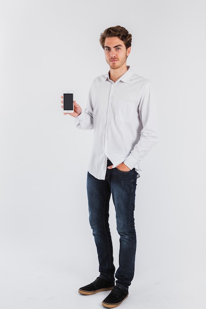 Young worker posing with phone