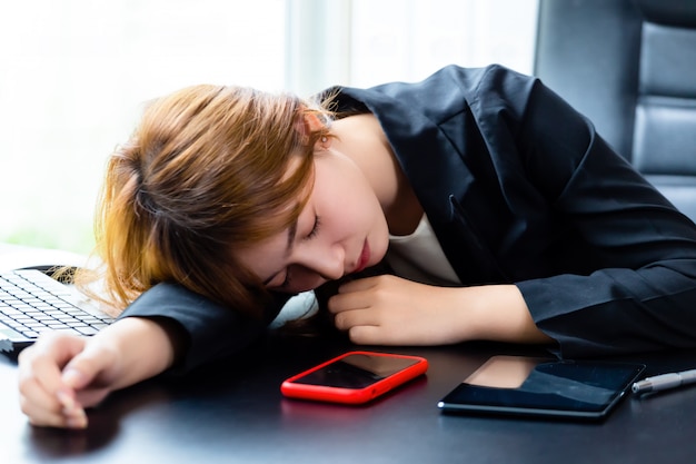 Free photo young working woman tired to work