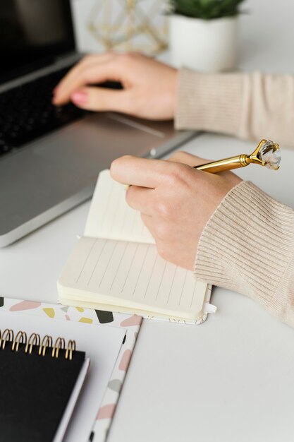 Young writer taking notes