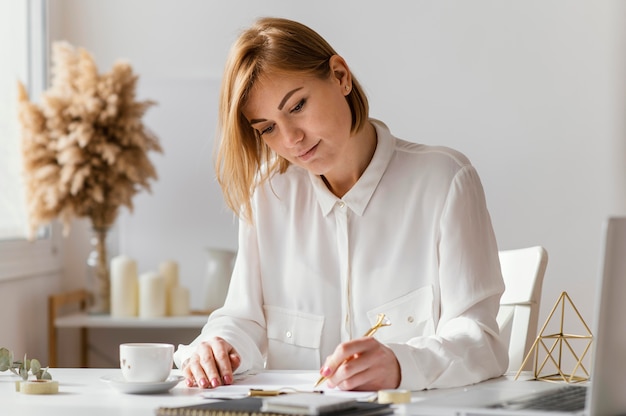 Young writer taking notes