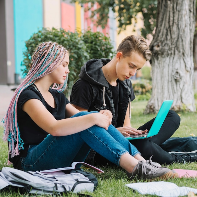 Youngsters in park studying