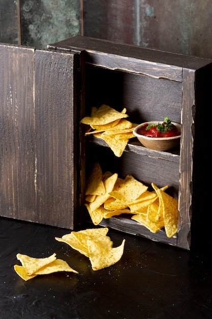 Yummy corn chips and relish in cupboard