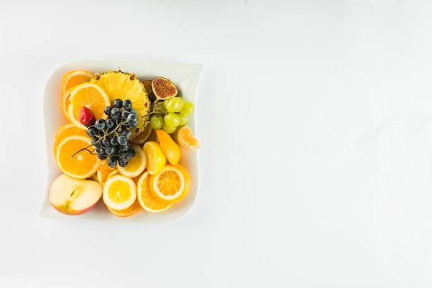 Yummy fruits on plate