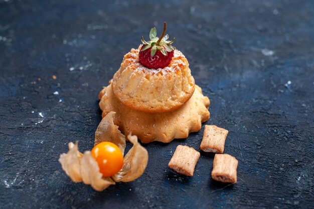 yummy little cake with pillow formed biscuits on blue