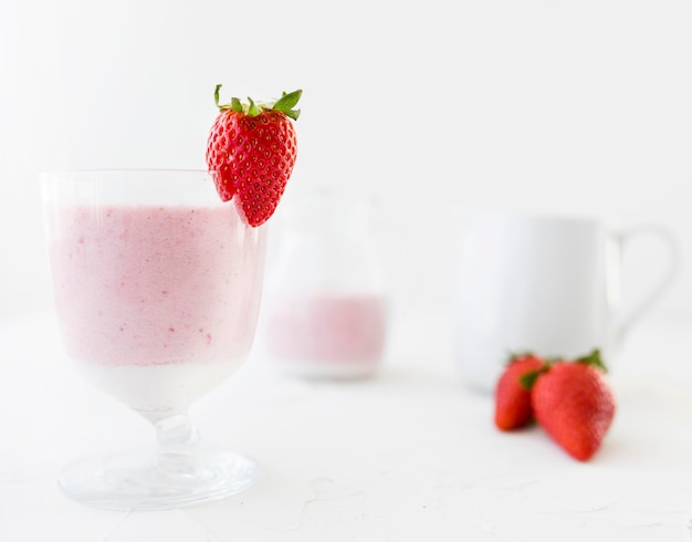 Free photo yummy strawberry milkshake in glasses