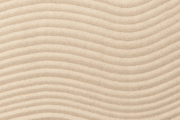 Free photo zen sand wave textured background in wellness concept