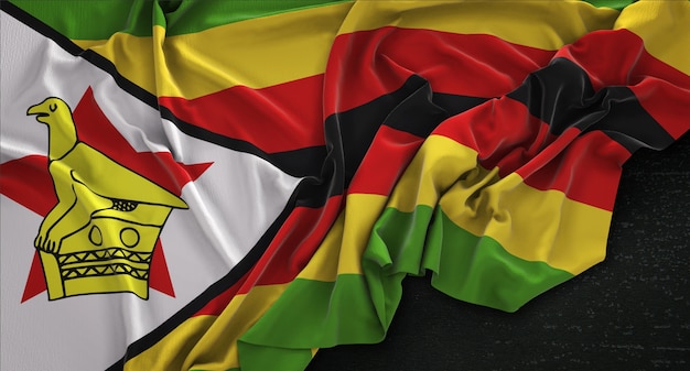 Free photo zimbabwe flag wrinkled on dark background 3d render