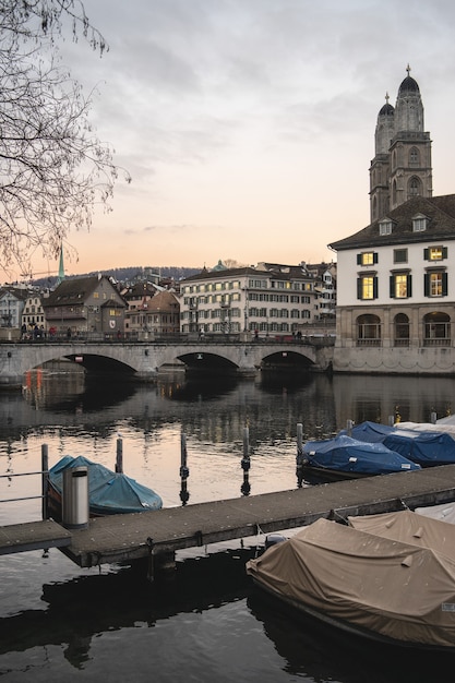 Free Photo zurich, switzerland with munsterbrucke bridge over limmat river