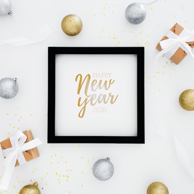 2020 happy new year frame with gifts arround