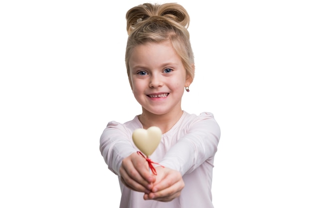 Free PSD adorable girl with heart shaped candy