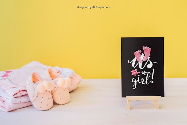 Free PSD baby girl mockup with board and shoes